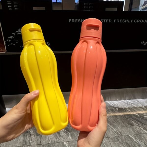52d7ffab-2768-497b-8664-e04f880d9591.jpg Premium Cola-Shaped Narrow-Mouth Travel Bottle
